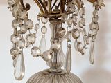 a crystal chandelier hanging from the ceiling