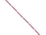 a close up of a pink bracelet on a white background