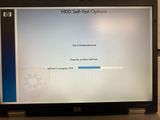 laptop screen displaying a text message that reads hdd self - test options