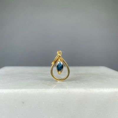 Pendentif en or jaune 750/1000 (18K) orné en son centre d'un…