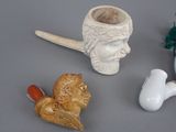 three different types of figurines on the table