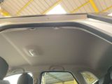 a view of the inside of a car with the door open