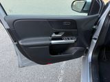 a car door open with the driver ' s side door open
