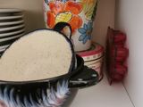 a black and white bowl and a black and white bowl on a shelf
