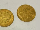 two gold sovereigns, one of which is a sovereign and the other of which is a sovereign
