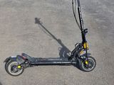a scooter that is sitting in the street