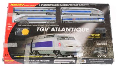 une boîte sur laquelle est représenté un train qui se trouve à l'intérieur de la boîte