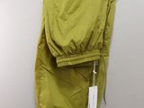 an image of a green jacket hanging on a hanger