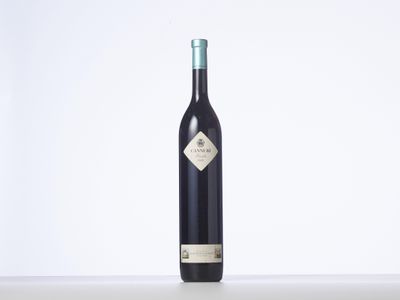 a bottle of wine that is sitting on a table