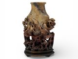 an image of a vase on a stand on a white background