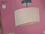 a pink box with a light on it in a store
