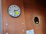 a clock that is on the wall of a room