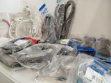 a lot of wires and cords on a table