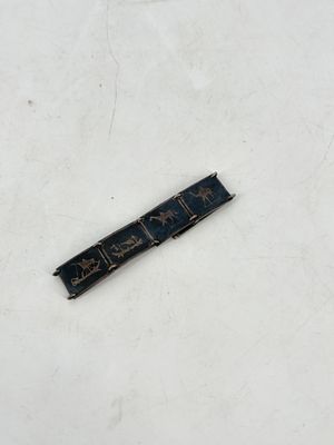 a small piece of paper with writing on it on a white surface
