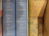 trois livres dans une boîte, posés les uns à côté des autres