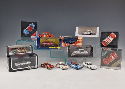 a lot of toy cars that are in a display case