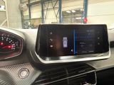 the dashboard of a car with a digital display in the center
