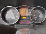 a close up of a car dashboard with a speedometer and gauges