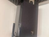 a picture of a speaker that is attached to a wall