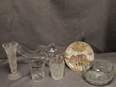 a lot of glass items that are on a table