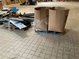 a pile of boxes and other items on the floor