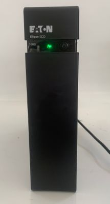 a black electronic device with a green light on it
