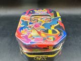 a small tin box that has a picture of a person on it