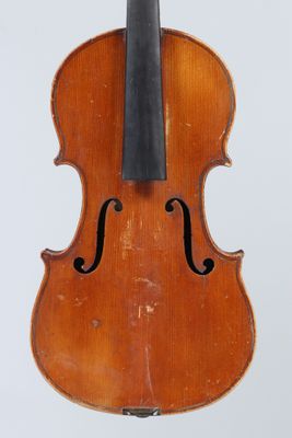 an old violin with a black bow on a white background