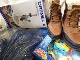 a pair of shoes that are sitting on a pile of toys