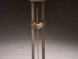 an image of a metal stand with a bird on it