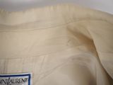 an image of a close up of a shirt with a label on it