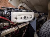 a close up of a car ' s engine with the hood open