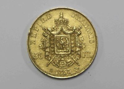 l'image d'une pièce d'or sur laquelle figurent des armoiries