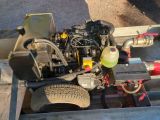 a small engine that is attached to a trailer