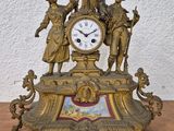 a clock that is sitting on top of a table