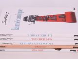 three books that are stacked on top of each other
