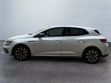 a white car is parked in a room with a white wall