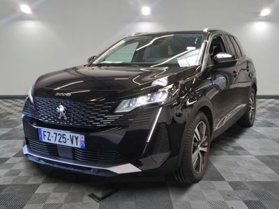 the front of a black suv parked on a checkered floor