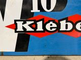 a sign that says klebe on the side of a building