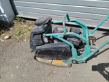 a lawn mower that is sitting on the ground