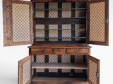 an old wooden cabinet with open doors and drawers