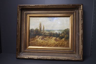une peinture à l'huile d'un paysage avec une église au loin