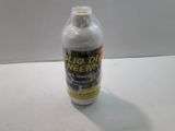 a bottle of liquid that is sitting on a table