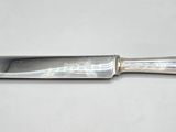 a knife that is sitting on a table