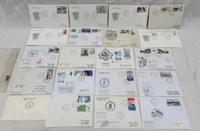 a lot of stamps and envelopes laid out on a table