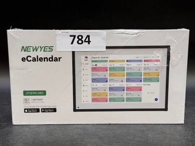 une boîte sur laquelle figure un calendrier, posée sur une table