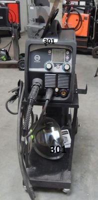 an image of a welding machine in a garage