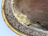 an image of a close up of a vase with a bird on it
