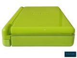 green plastic lunch box with lid on white background