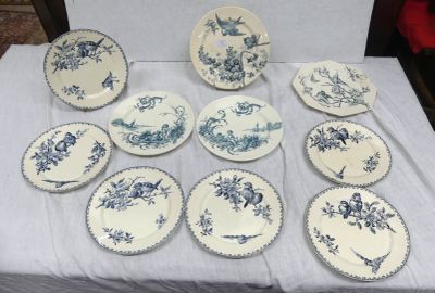 many plates that are sitting on a table